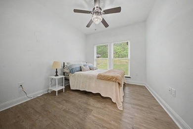 Beautifully designed 3-bedroom, 2.5-bath home backing up to the - photo 13