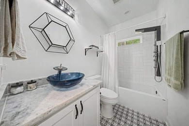 Beautifully designed 3-bedroom, 2.5-bath home backing up to the - photo 14