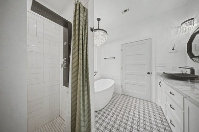 Beautifully designed 3-bedroom, 2.5-bath home backing up to the - photo 16