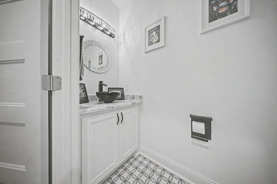 Beautifully designed 3-bedroom, 2.5-bath home backing up to the - photo 21