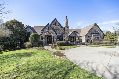 Custom built and located on a beautiful peninsula within the - photo 2
