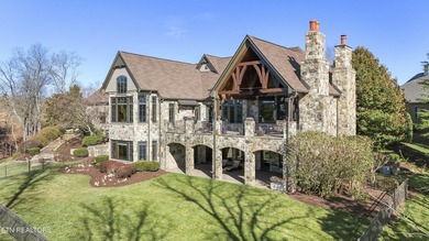 Custom built and located on a beautiful peninsula within the - photo 3