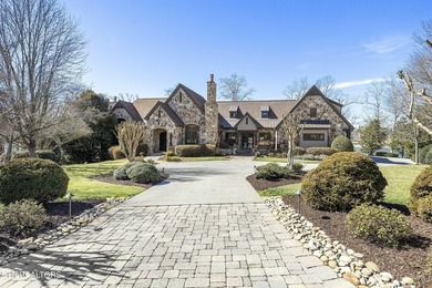 Custom built and located on a beautiful peninsula within the - photo 5