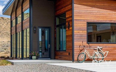 This modern rural retreat is 5 minutes east of downtown Cody, on