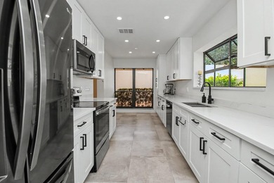 This beautifully updated 3-bedroom, 2-bathroom residence offers - photo 15