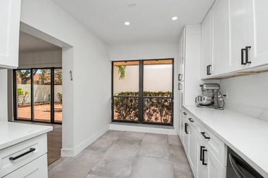 This beautifully updated 3-bedroom, 2-bathroom residence offers - photo 18