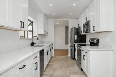 This beautifully updated 3-bedroom, 2-bathroom residence offers - photo 19