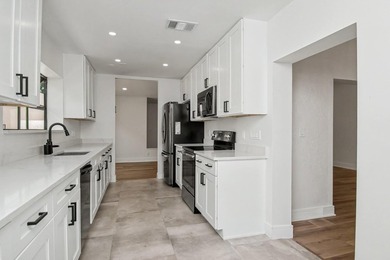 This beautifully updated 3-bedroom, 2-bathroom residence offers - photo 21