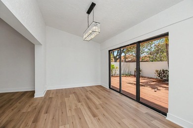 This beautifully updated 3-bedroom, 2-bathroom residence offers - photo 22