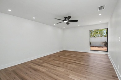 This beautifully updated 3-bedroom, 2-bathroom residence offers - photo 25