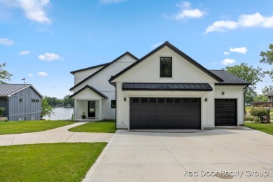 Lake Home For Sale in Stanwood, Michigan