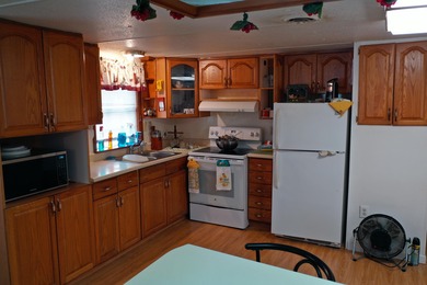 75 acres with a well maintained 3 Bedroom 2 Bath manufactured