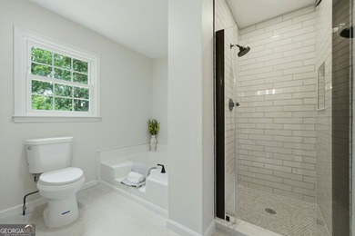 Move-in ready and completely remodeled! This 3-bedroom, 2-bath - photo 14