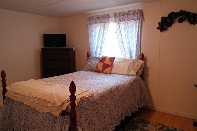 75 acres with a well maintained 3 Bedroom 2 Bath manufactured