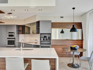 Beautifully Renovated wrap-around condo features 3BR, 2.5BA with - photo 5