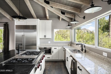 Set on a quiet acre in the heart of Paradise Valley, this