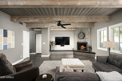 Set on a quiet acre in the heart of Paradise Valley, this