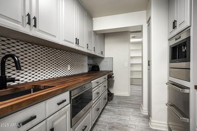 Set on a quiet acre in the heart of Paradise Valley, this