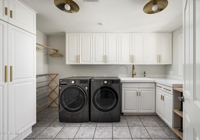 Set on a quiet acre in the heart of Paradise Valley, this