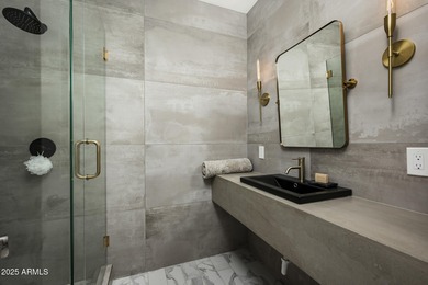 Set on a quiet acre in the heart of Paradise Valley, this