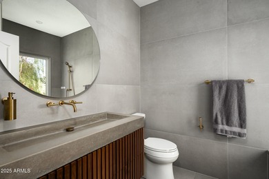 Set on a quiet acre in the heart of Paradise Valley, this