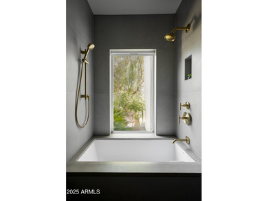 Set on a quiet acre in the heart of Paradise Valley, this