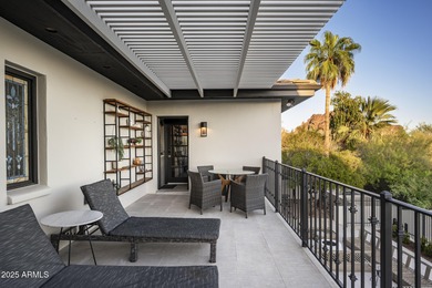 Set on a quiet acre in the heart of Paradise Valley, this