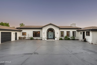 Set on a quiet acre in the heart of Paradise Valley, this