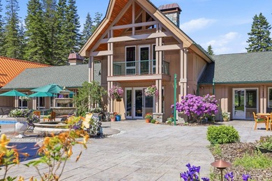 Perched behind a grand gated entrance and winding tree-lined - photo 2