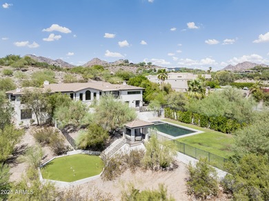 Set on a quiet acre in the heart of Paradise Valley, this