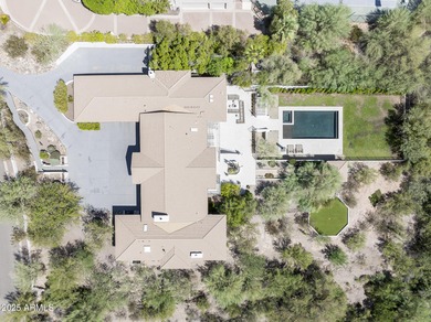 Set on a quiet acre in the heart of Paradise Valley, this