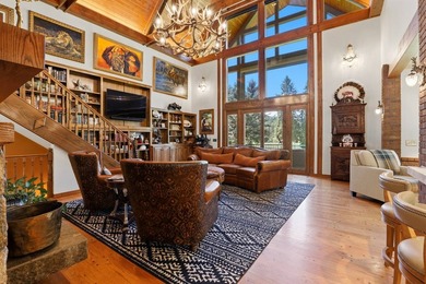 Perched behind a grand gated entrance and winding tree-lined - photo 8