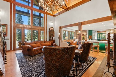 Perched behind a grand gated entrance and winding tree-lined - photo 9