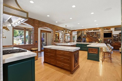 Perched behind a grand gated entrance and winding tree-lined - photo 10