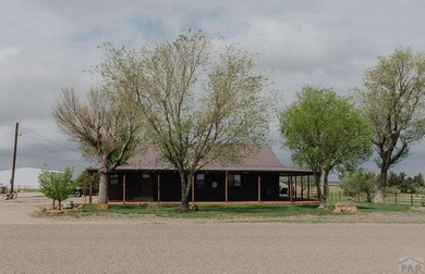 This exceptional 295 acre irrigated farm and feedlot spans two - photo 2
