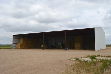 This exceptional 295 acre irrigated farm and feedlot spans two - photo 4