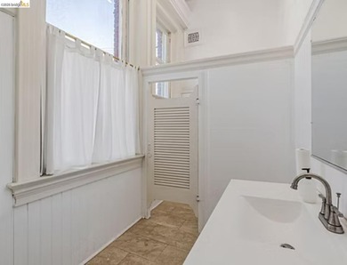 This two-story commercial property, built in 1906, offers 5,600 - photo 9