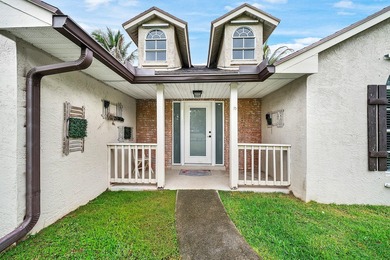 Set on a beautifully manicured and fenced 1.15-acre lot, this - photo 11