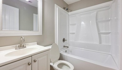 Freshly updated townhome, WITH A BRAND NEW ROOF in 2026. This - photo 14