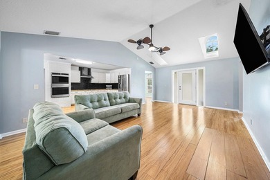 Set on a beautifully manicured and fenced 1.15-acre lot, this - photo 14