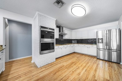 Set on a beautifully manicured and fenced 1.15-acre lot, this - photo 19