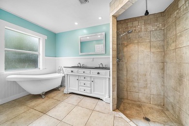 Set on a beautifully manicured and fenced 1.15-acre lot, this - photo 22