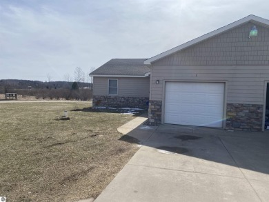 Lake Home For Sale in Benzonia, Michigan