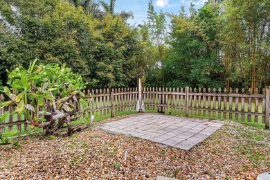 Set on a beautifully manicured and fenced 1.15-acre lot, this - photo 33