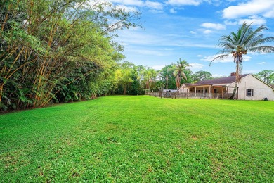 Set on a beautifully manicured and fenced 1.15-acre lot, this - photo 36