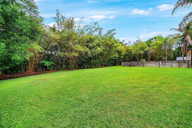 Set on a beautifully manicured and fenced 1.15-acre lot, this - photo 37