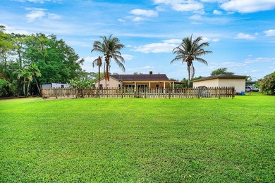 Set on a beautifully manicured and fenced 1.15-acre lot, this - photo 38