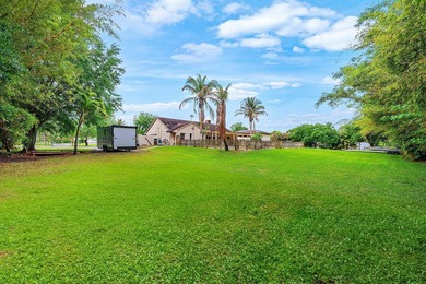 Set on a beautifully manicured and fenced 1.15-acre lot, this - photo 39