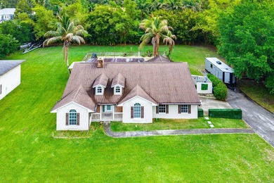 Set on a beautifully manicured and fenced 1.15-acre lot, this - photo 42