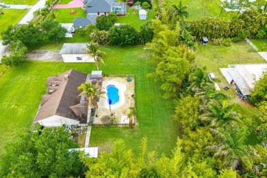 Set on a beautifully manicured and fenced 1.15-acre lot, this - photo 44